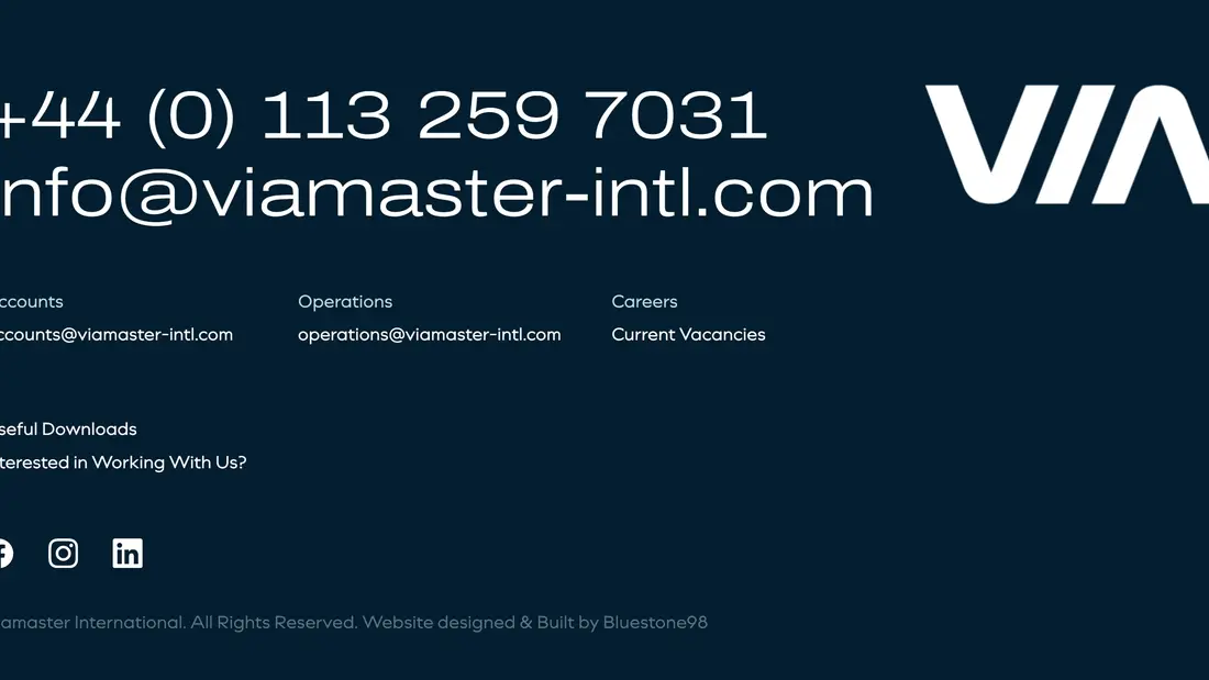 Секция «Футер» с сайта https://www.viamaster-intl.com/, тематика — Логистика, цвета — Черный, стиль — Корпоративный, Минимализм, типографика — Без засечек